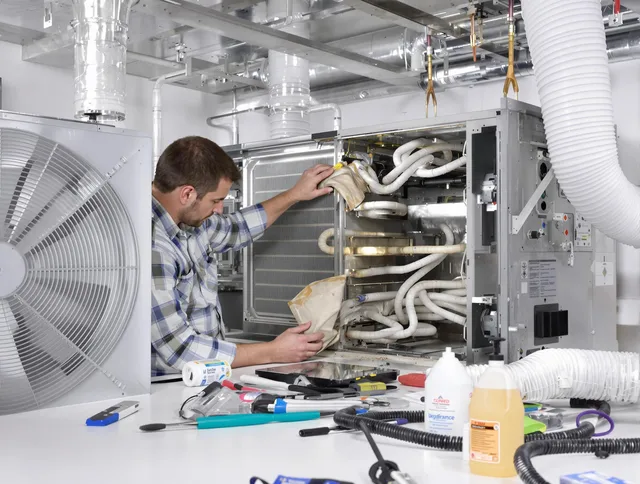 Wareham Air Duct Cleaning specialist performing precision AC coil cleaning in Wareham