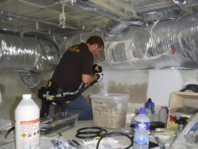 Wareham Air Duct Cleaning specialist performing professional mold removal from air ducts in Wareham