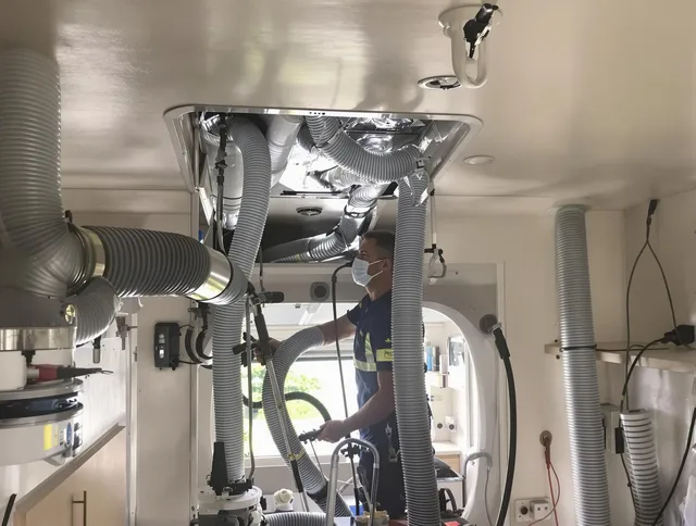 Wareham Air Duct Cleaning specialist performing precise mobile home duct cleaning in Wareham