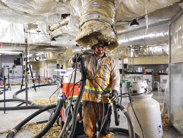 Professional vacuum insulation removal by Wareham Air Duct Cleaning expert in Wareham